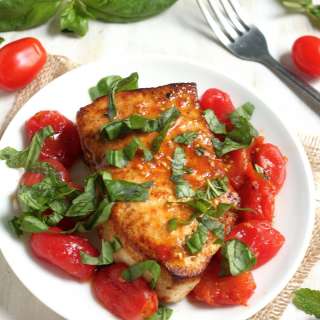 One-Pan Sicilian Swordfish with Spicy Olive Oil Poached Tomatoes