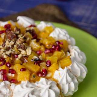 Winter Pavlova with Lemon Curd Cream and Orange Caramel