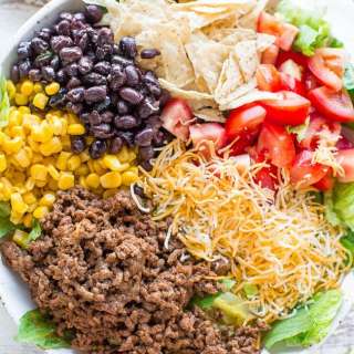 Loaded Beef Taco Salad with Creamy Lime Cilantro Dressing