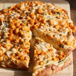 Buffalo Chickpea Pizza with White Garlic Sauce and Celery Ranch Dressing