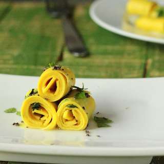 Vegan Khandvi- Chickpea Roll ups stuffed with Kale and Cilantro.