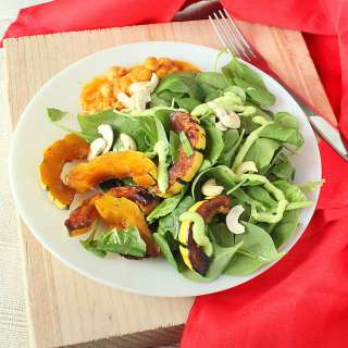 Maple Glazed Delicata Squash, Cashews, Baby Spinach Salad With Creamy Wasabi Dressing.
