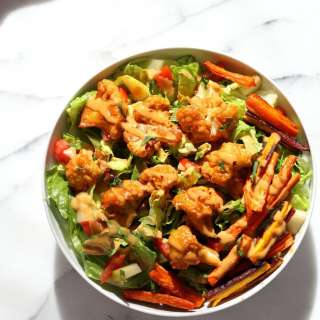 Peanut Butter Roasted Cauliflower and Carrot Salad Bowl
