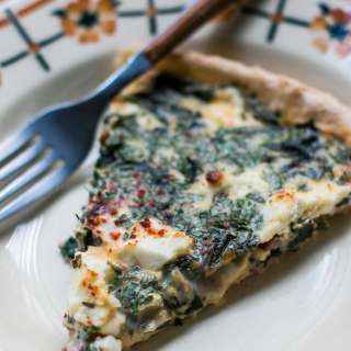 Quiche with greens, bacon and feta