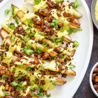 Baked Potato Wedges with Creamy Cheese Sauce and Tofu Bacony Bits