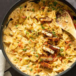 Vegan Creamy Cajun Pasta with Breaded tofu.