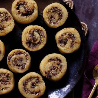 Gujiya Peda (Indian Almond Fudge With Coconut Pistachio Raisin Swirls)