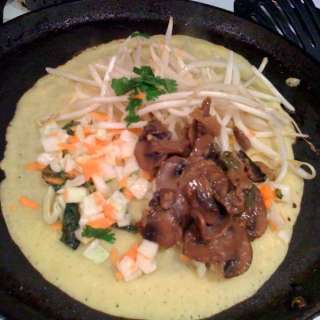 Banh Xeo (Vietnamese crepes) with nuoc cham sauce