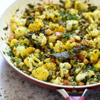 Cauliflower Chickpeas and Spinach in Mustard seed Curry Leaf Sauce