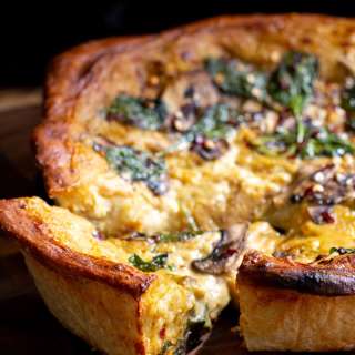 Cheesy Deep Dish Pizza with Pretzel Crust