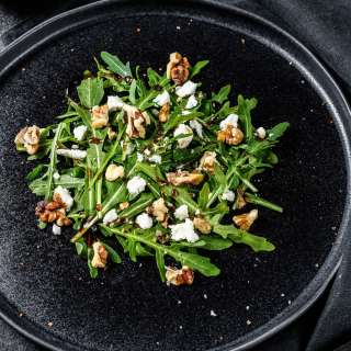Walnut Vinaigrette Over Wilted Arugula