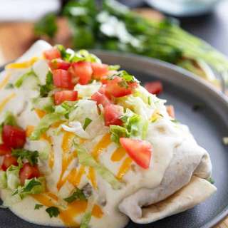 Smothered Burritos with Green Chile Sauce