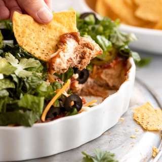 Vegetarian Layered Taco Dip with Refried Beans