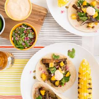 Beer-Marinated Grilled Mushroom Tacos with Pepita Slaw & Chipotle Crema