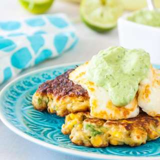 Corn and avocado fritters with avocado, yoghurt, coriander & lime sauce