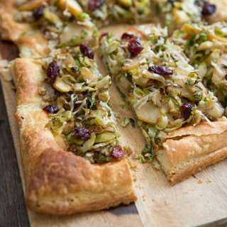 Brussels Sprout and Apple Tart with Walnut Pesto
