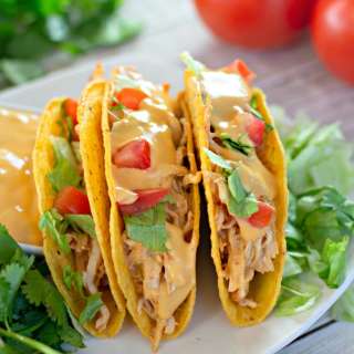 Slow Cooker Queso Chicken Tacos