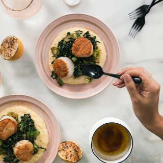Brown Butter Scallops with Sautéed Kale, Shishitos Over a Bed of Polenta