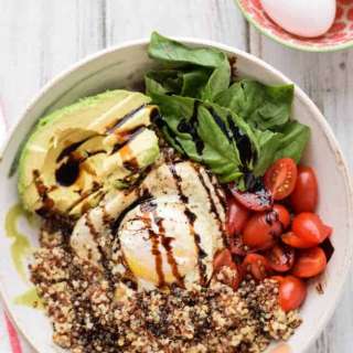 Quinoa Breakfast Bowl with Egg, Tomatoes and Avocado