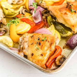 Easy Baked Chicken Thighs With Squash And Peppers