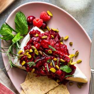 Baked Brie with Cranberry Raspberry Sauce