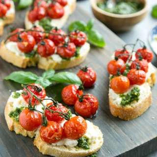 Tomato Confit Bruschetta with Ricotta and Basil Pesto