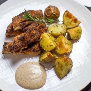 Baked Cajun Pork Ribs with Potatoes & Garlic Sauce