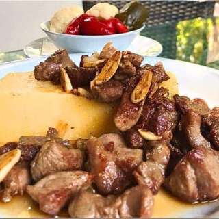 Traditional Romanian Pig’s Alms (Pomana Porcului)