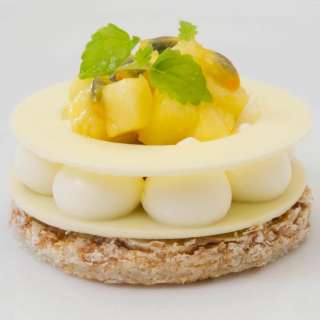 Coconut Dacquoise with Piña Colada Cream & Tropical Compote