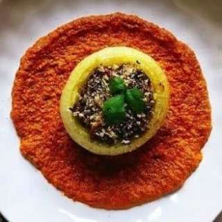 Quinoa Stuffed Onions with Romesco Sauce