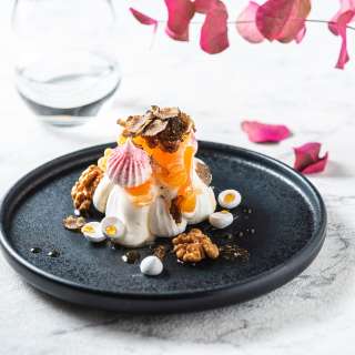 Pavlova with Tangerine and Black Truffles