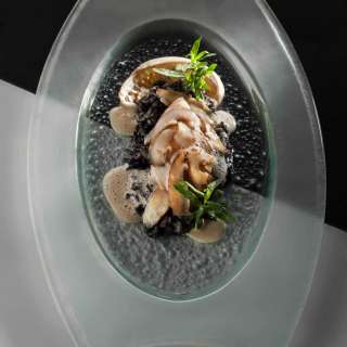 Abalone, Pan-Seared And Served With Squid-Ink Risotto