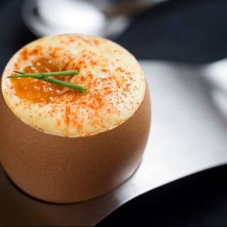 Deviled Eggs with Smoked Trout Gravlax and Corn Sabayon