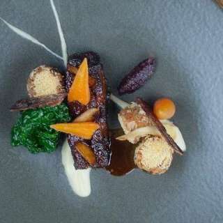 Slow Cooked Glazed Lamb Shoulder w/ Cheddar