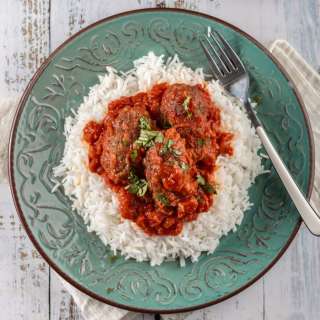 Soutzoukakia (Greek Meatballs in Red Sauce) with Rice