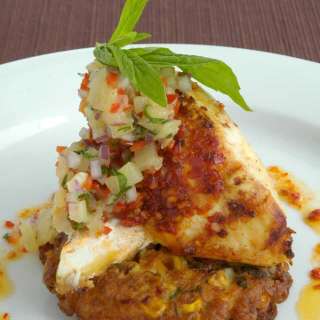 Harissa Chicken on Corn & Coriander Fritters with Pineapple Salsa