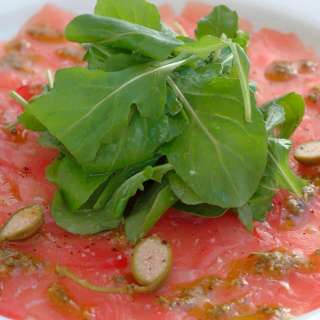 Tuna Carpaccio with Basil Oil, Lemon and Caper Berries
