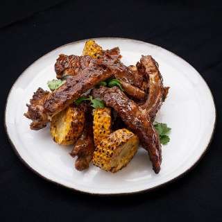 Fall-off-the-Bone Pork Spare Ribs with Juicy Corn and Cilantro