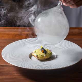 Sturgeon and Sauerkraut Tart topped with American Sturgeon Caviar