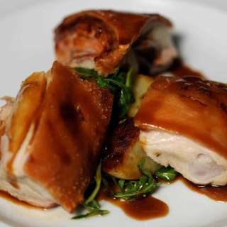 Suckling pig with Potatoes and Rocket