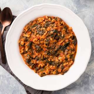 Red Spanakorizo: Greek Spinach and Rice with Tomatoes