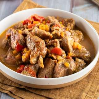 Greek-Style Braised Pork with Orange, Honey, and Peppers