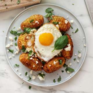 Hasselback Potatoes with Fried Eggs and Cheese