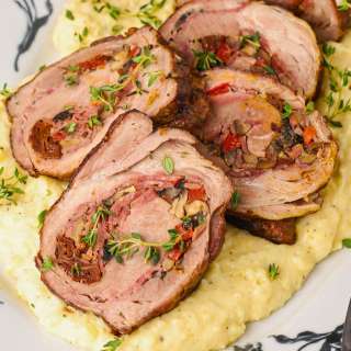 Stuffed Pork Loin w/ Bacon, Sun-Dried Tomatoes & Mushrooms