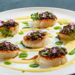 Pan-Seared Hokkaido Scallops with Corn Cream, Beluga Lentils & Dill Oil