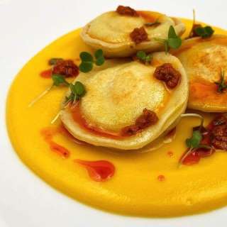 Ricotta and Smoked Quails Egg Ravioli with Butternut Squash Velouté