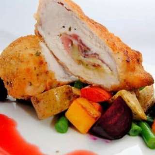 Chicken Cordon Bleu on Roasted Vegetables with a Beetroot & Chicken Jus