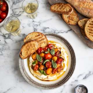 Whipped feta with roasted tomatoes and garlic