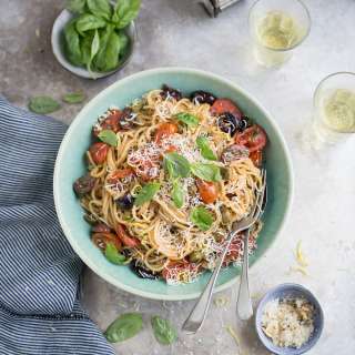 Pasta with tomato, olives, anchovy, basil & lemon