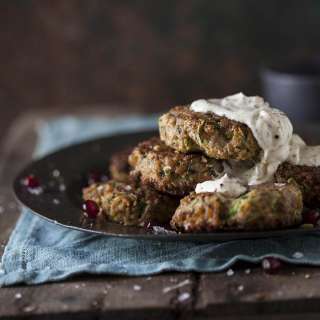 Pork and zucchini burgers with spring onion and cumin